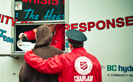 A client being offered hot meals during difficult times