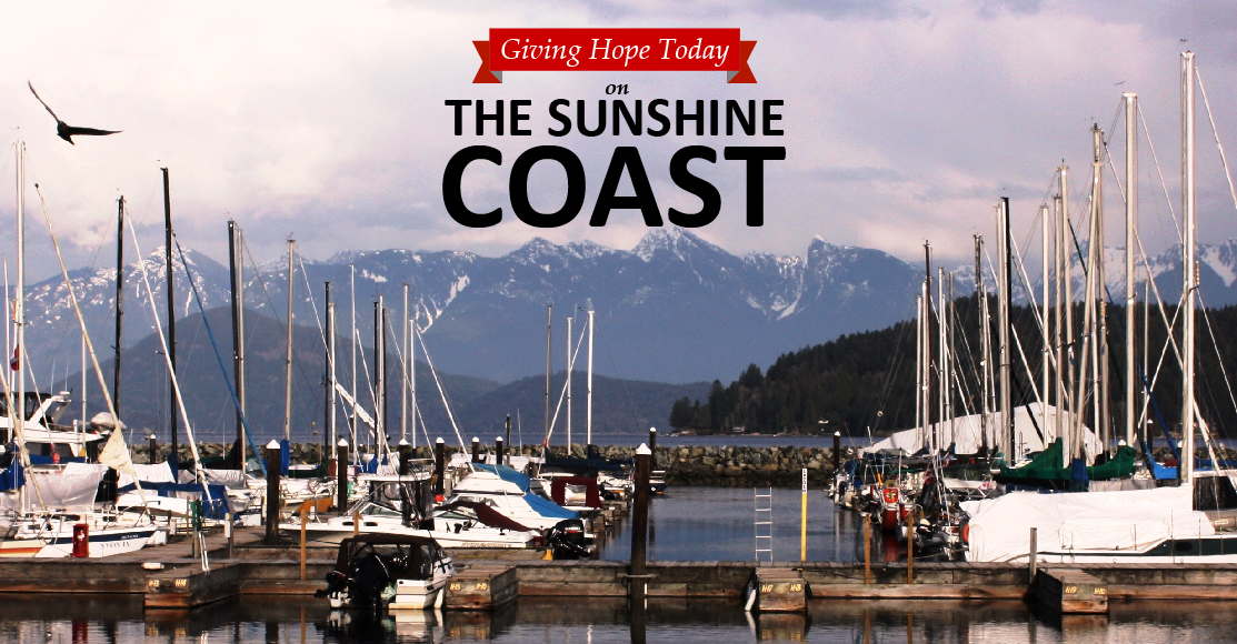 The Sunshine Coast text written on an image of boats in a sea